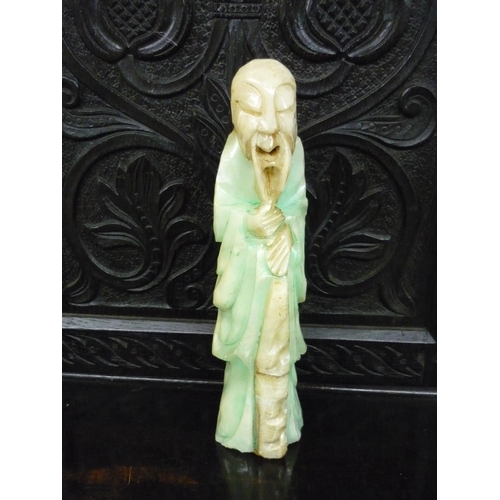 288 - Carved Chinese style quartz figure of an elderly gentleman (26cm high)