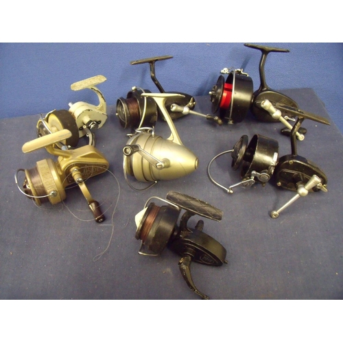 Collection of seven vintage spinning reels including J.W. Young & Sons  Ambidex casting reel, Mitchel