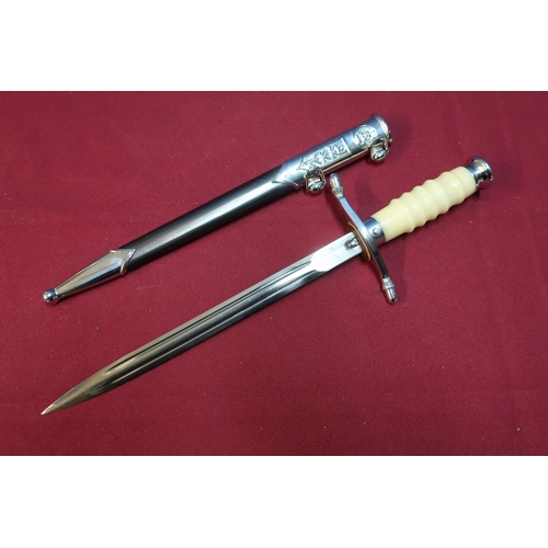 63 - East German (DDR) Army Officers dagger with blue steel scabbard and plated mounts, the top mount bea... 