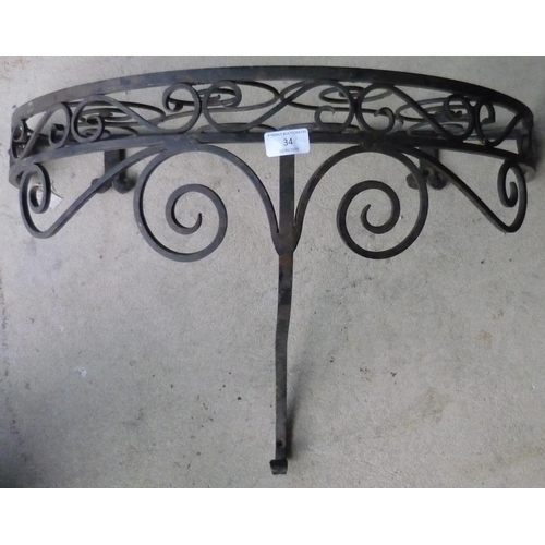 34 - Wrought iron wall mounting plant stand
