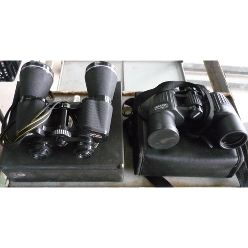 56 - Pair of Miranda binoculars, and a pair of Opticron binoculars