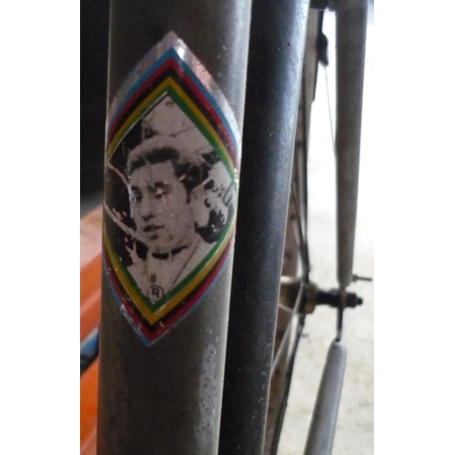 58 - 1970's Eddy Merckx racing bike and a Lycett leather racing saddle
