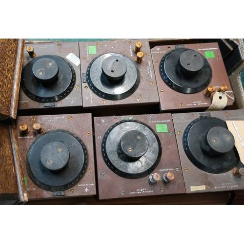 124 - Eight various military condenser variable X6F units with broad arrow marks in wooden casings