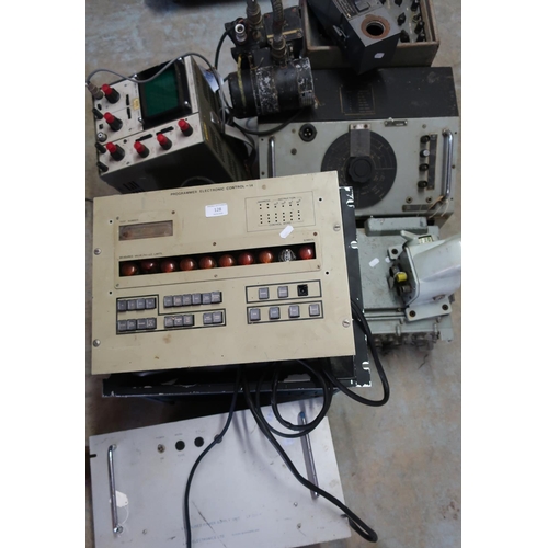 128 - Large selection of mid to late 20th C military electronics, including programmer electric control un... 