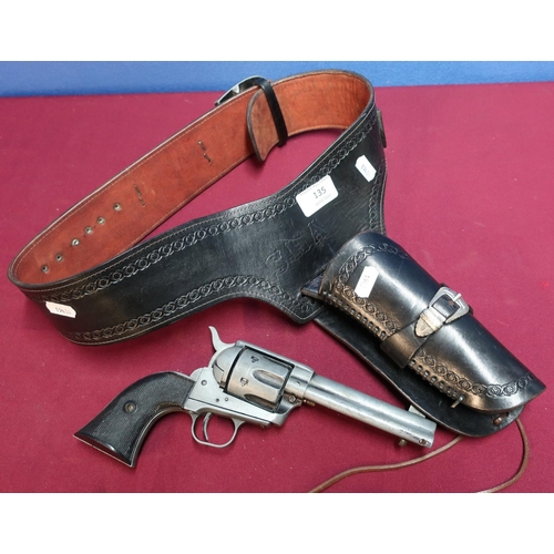 135 - Tooled leather Western style gun holster belt with a replica model single Action Army .45 1874 revol... 