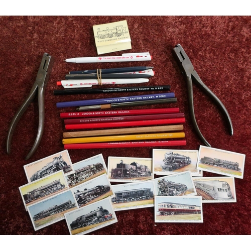 11 - Box containing a quantity of various railway related pencils, pens, cigarette cards, ticket punches ... 