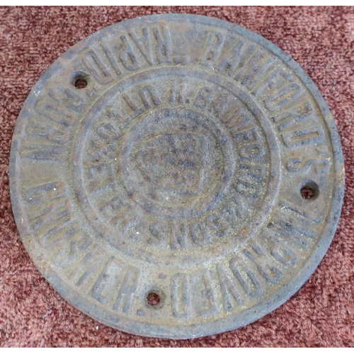 44 - Cast metal plaque for Bamford's Improved Corn Crusher (diameter 15.5cm)