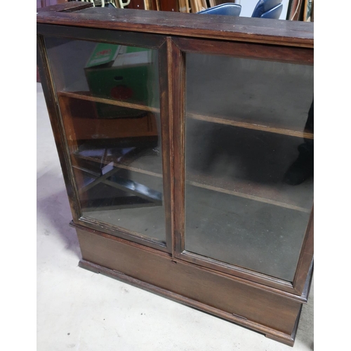 474 - Early - mid 20th C side cabinet enclosed by two glazed doors above fall front (93cm x 27cm x 102cm)