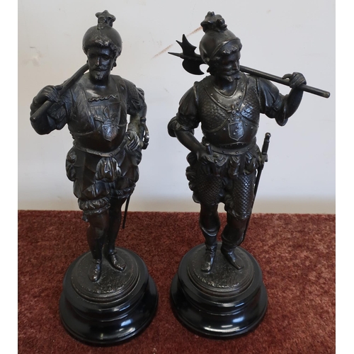 481 - Pair of 19th/20th C Spelter figures of a continental style armoured axe-man, on turned ebonised base... 