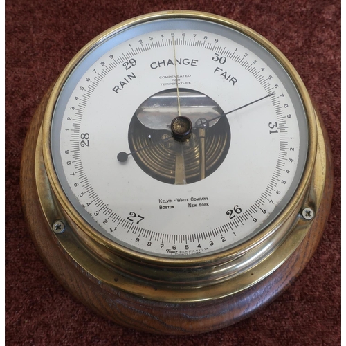 483 - Oak mounted brass cased bulkhead style barometer by Kelvin White Company, Boston, New York (diameter... 