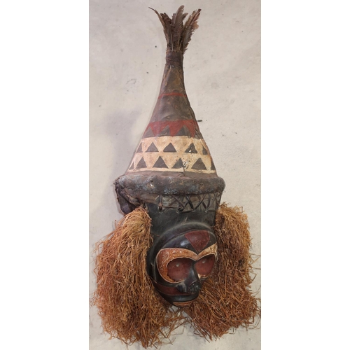 486 - Unusual African style tribal witch doctor's head mask with carved face and hessian type beard, with ... 