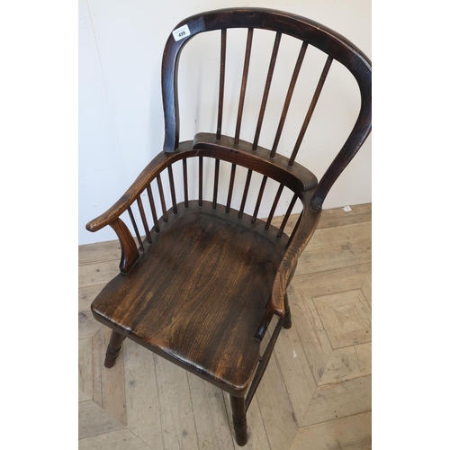 499 - 19th C elm Windsor style stick back armchair on turned supports and H shaped understretcher