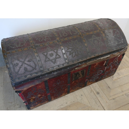 500 - Unusual 19th C leather bound and studded dome top travelling trunk, the top with various panels incl... 