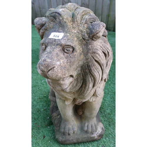 524 - Pair of apposing concrete well weathered sitting lions