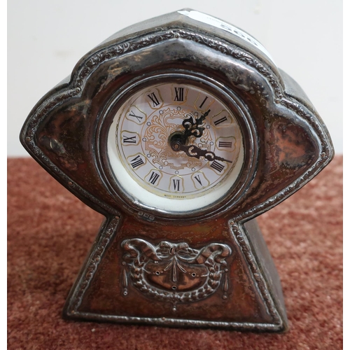 566 - Small German made desk clock with silver hallmarked panel to the front (13cm high)