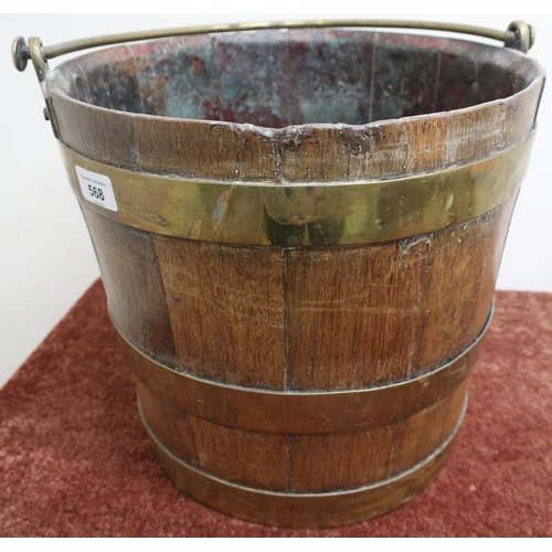 568 - Brass coopered oak bucket with swing handle (32cm high)