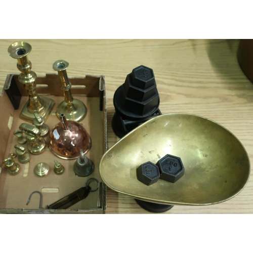 579 - Selection of various brass graduating weights, copper funnel, balance scales, candlesticks and a set... 