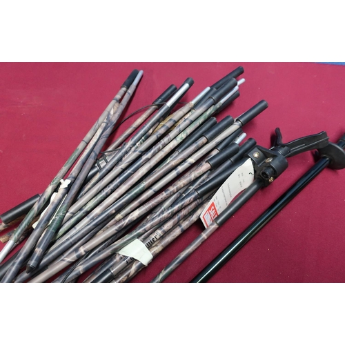 476 - Box containing two bipod sticks, various spares and repairs, and fold away tripods sticks