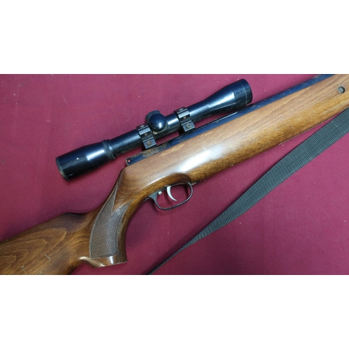 509 - Weihrauch HW80 brake barrel .22 air rifle with sound moderator and 4x32 scope, with box of associate... 