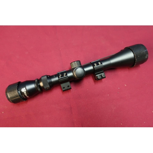 458 - Niko sterling 3-9 x 40 Mount Master rifle scope with roll off mounts