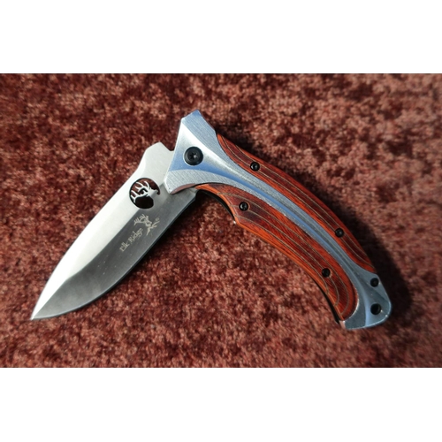 522 - Boxed as new Elk Ridge pocket knife with folding blade and belt clip