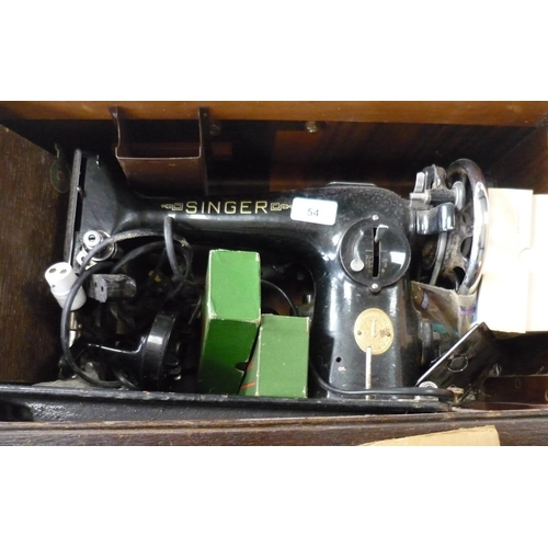 54 - Boxed Singer sewing machine (electric)