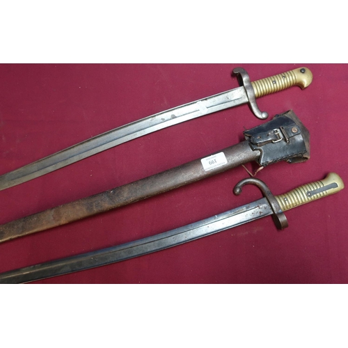 199 - French 19th C bayonet, complete with steel scabbard and leather frog, the top strap dated 1876, and ... 