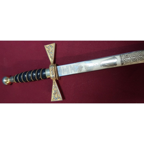 207 - Wilkinson Sword Company Irish presentation sword with engraved blade and cross hilt