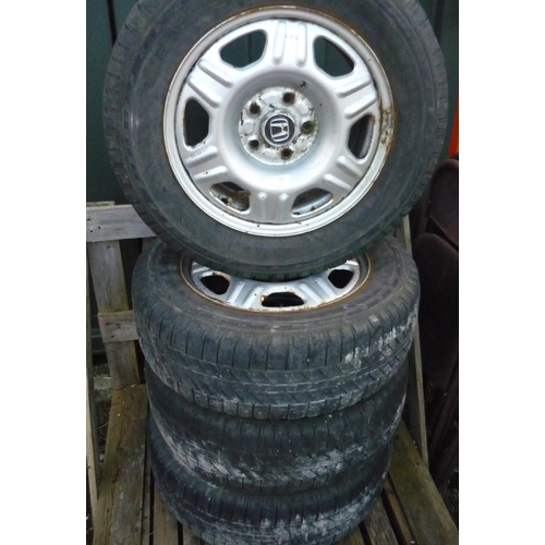 133 - Four Honda alloy wheels with Michelin tyres