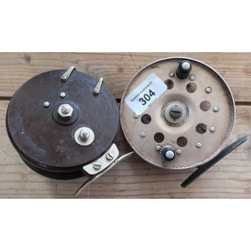 355 - Allcock Aerialite Bakelite boat reel and a British made Strike Light featherflow reel