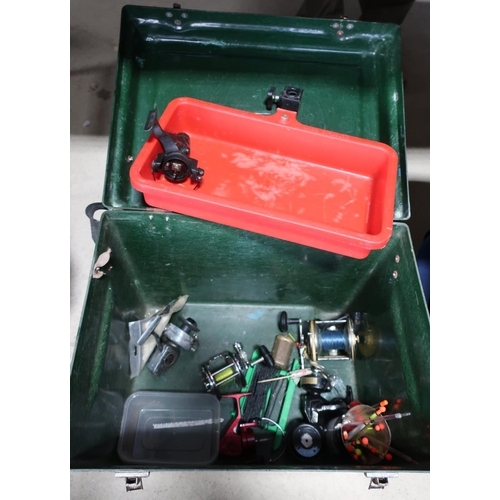 330 - Fibre glass tackle box with contents including floats, reels etc