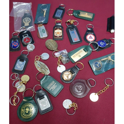 234 - Large collection of various assorted keyrings and keyring fobs including various vehicles, Masonic, ... 