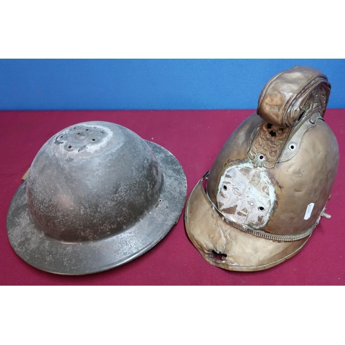 260 - Late Victorian copper fireman's type helmet with raised and embossed cross with figure of a dragon (... 