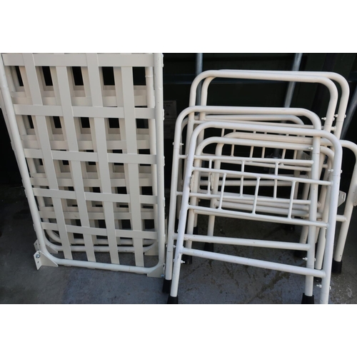 293 - Set of four metal framed military hospital style single bed frames