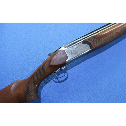 817 - Boxed left handed Silma 12 bore over & under ejector shotgun with 28 inch barrels with multi-chokes,... 