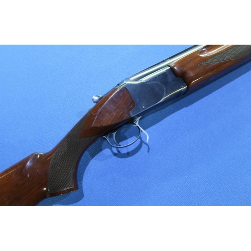 825 - Winchester Model 99 12 bore over & under ejector shotgun with 28 inch barrels, choke 1/2 & IC, with ... 