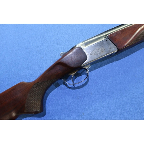 830 - Baikal 12 bore over & under ejector shotgun with 27 inch barrels and 14 1/4 inch pistol grip stock, ... 