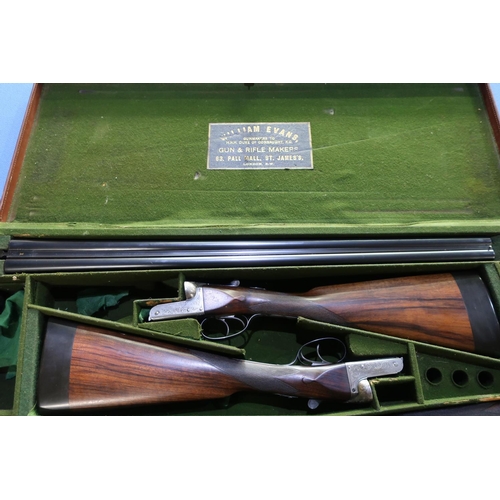 863 - Cased pair of William Evans 12 bore side by side ejector shotguns with 28 inch barrels and 14 3/4 in... 