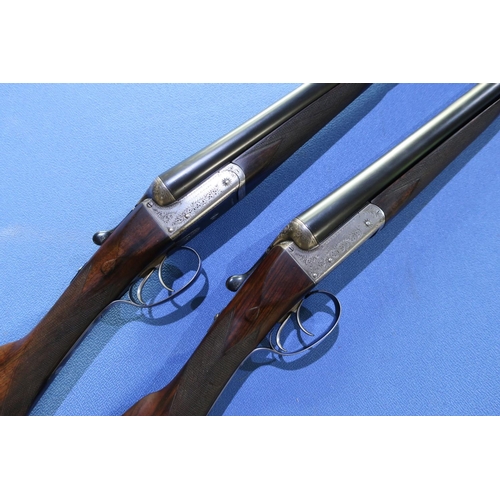 863 - Cased pair of William Evans 12 bore side by side ejector shotguns with 28 inch barrels and 14 3/4 in... 