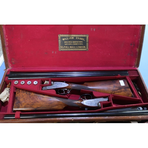 864 - Cased pair of William Evans 12 bore side by side side-lock ejector shotguns with 28 inch barrels, ch... 