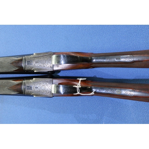 864 - Cased pair of William Evans 12 bore side by side side-lock ejector shotguns with 28 inch barrels, ch... 