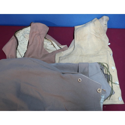 284 - Selection of early 20th C clothing including a suede waistcoat, another waistcoat and two pairs of b... 