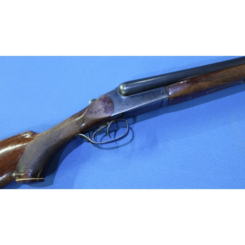 869A - Baikal 12 bore side by side shotgun, with 28 1/2 inch barrels, serial no. A38351 (shotgun certificat... 