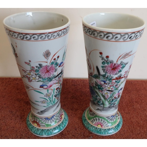 1 - Pair of Oriental style vases of tapering form, decorated with birds and foliage (height 25cm)