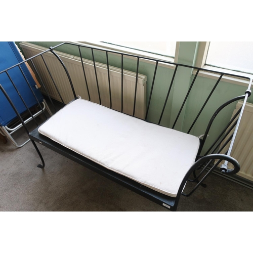 108 - Wrought metal two seat bench with later added loose swab cushion (width 137cm)