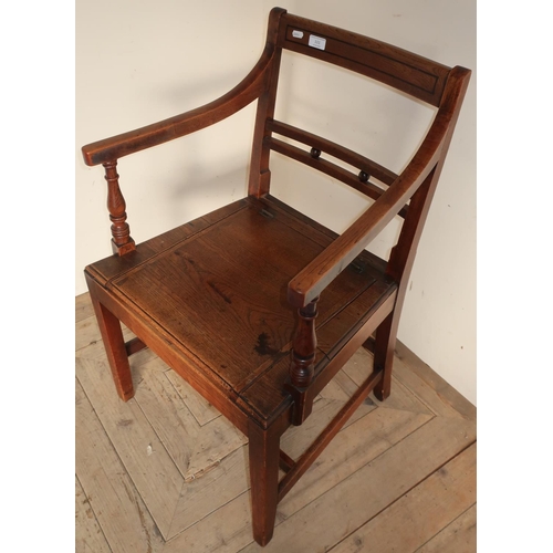 111 - 19th C elm commode armchair with lift up seat on square tapering supports