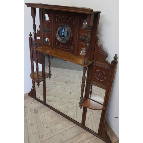 113 - Late Victorian mahogany over mantel mirror with multiple beveled edge mirrored panels on turned colu... 