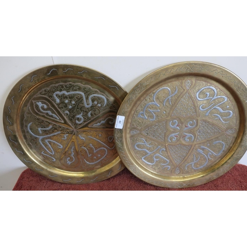 19 - Pair of brass and white metal inlaid Indo Persian chargers with etched and engraved detail (diameter... 