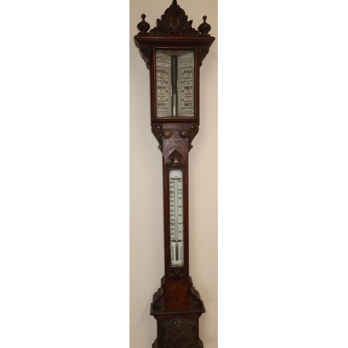 22 - W. Sugg & Co Ltd Westminster oak cased stick barometer with carved detail (length 110cm)
