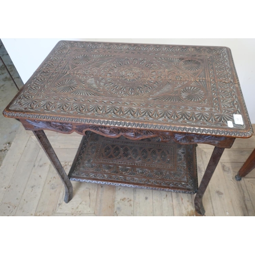 53 - 19th C carved oak Eastern style two tier rectangular occasional table (73cm x 47cm x 65cm) (split to... 